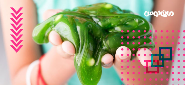 اسلایم سبز رنگ در دستان کودک