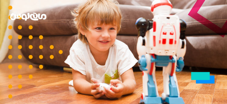 کودک در حال خندیدن به ربات بزرگ