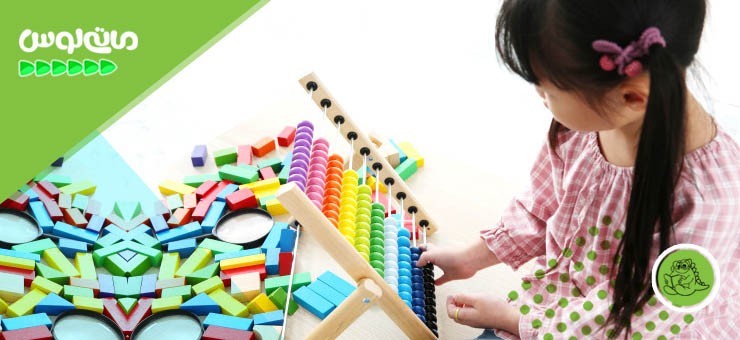 دختربچه درحال بازی با چرتکه